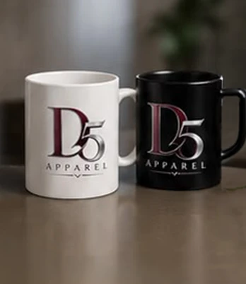 White and black D5 Apparel mugs